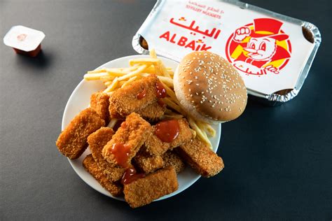 20 pieces of chicken nuggets + large fries + coleslaw + 6 buns + 1. . Al baik near me